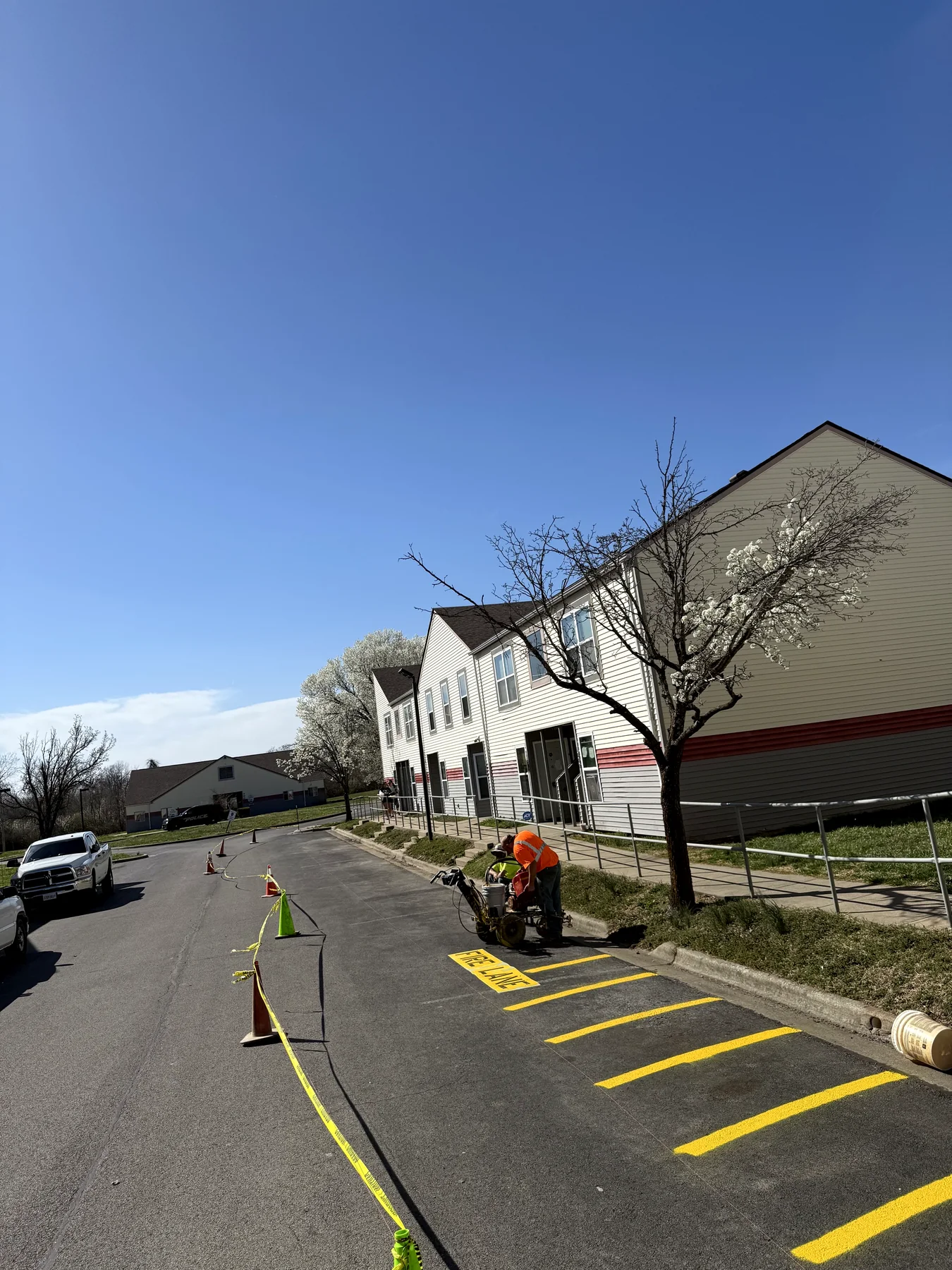 Crew performing commercial striping work